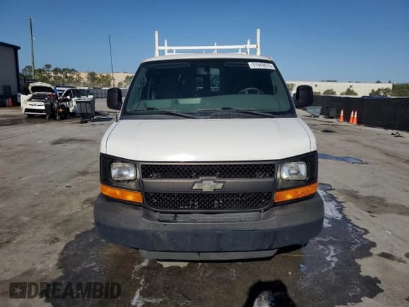✅ 2014 Chevrolet Express Cargo • VIN: 1GCWGFBA3E1147865 • Lot: 51949675. Listed on Copart with 128,578 mi. Free auction sales archive from the USA and detailed vehicle history report at DreamBid. Image 5.