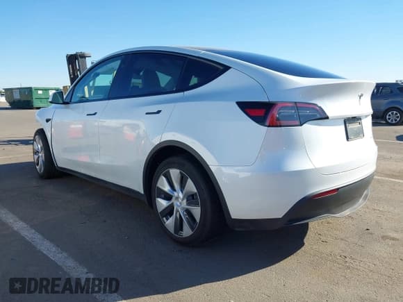 ✅ 2023 Tesla Model Y Long Range • VIN: 7SAYGDEE1PF826879 • Lot: 43393771. Listed on IAAI with 35,091 mi. Free auction sales archive from the USA and detailed vehicle history report at DreamBid. Image 3.