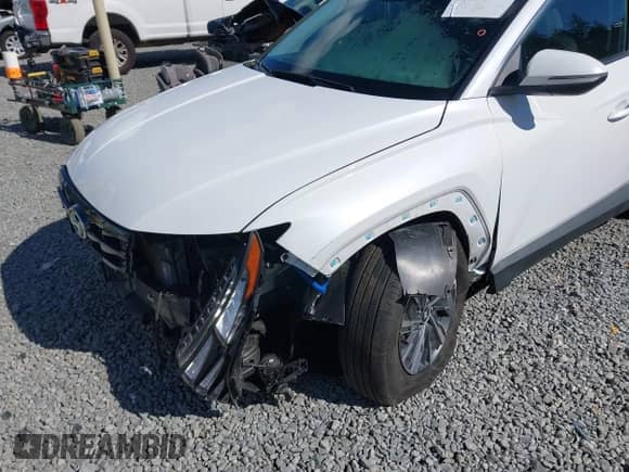 2023 Hyundai Tucson Blue z VIN KM8JBCA1XPU113640, wystawiony jako IAAI lot #42843566 z przebiegiem 56 035 mil mil oraz . Historia ofert i sprzedaży dostępna na DreamBid. Obrazek 6.