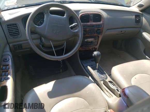 1999 Hyundai Sonata GLS with VIN KMHWF35V9XA100869, listed as a Copart auction lot 68219694 with 144,388 mi miles and Non repairable. Bid and sale history available at DreamBid. Image 8.