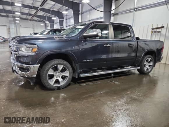 2019 Ram 1500 Laramie с VIN 1C6SRFJT0KN574489, выставлен на аукционе Copart как лот 84782045 с пробегом 112 778 миль миль и Списание • Salvage title. История ставок и продаж доступна на DreamBid. Изображение 1.