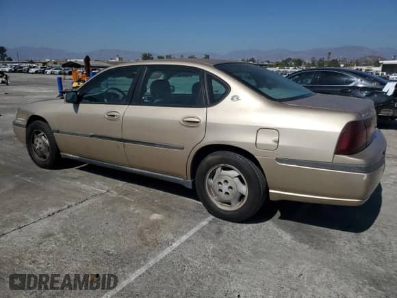 2004 Chevrolet Impala with VIN 2G1WF52E949127977, listed as a Copart auction lot 71259914 with 103,782 mi miles and Salvage title. Bid and sale history available at DreamBid. Image 2.