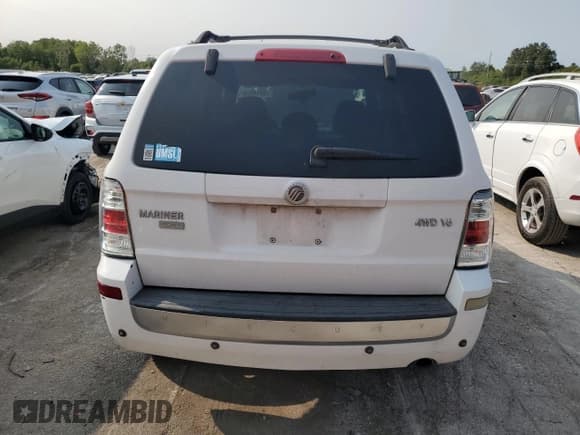 ✅ 2008 Mercury Mariner Premier • VIN: 4M2CU97158KJ13733 • Lot: 70914064. Wystawiony na Copart z przebiegiem 189 301 mil. Bezpłatny archiwum sprzedaży aukcyjnych z USA i szczegółowy raport historii pojazdu na DreamBid. Zdjęcie 6.