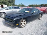✅ 2014 Dodge Challenger SXT • VIN: 2C3CDYAGXEH233905 • Lot: 43784622. Listed on IAAI with 140,525 mi. Free auction sales archive from the USA and detailed vehicle history report at DreamBid. Image 2.