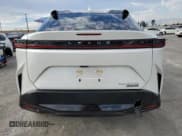 ✅ 2023 Lexus RZ 450e Premium • VIN: JTJAAAAB4PA020616 • Лот: 82579235. Опубликован ранее на Copart с пробегом 15 333 миль. Бесплатный доступ к архиву аукционных продаж из США и подробный отчёт об истории автомобиля на DreamBid. Изображение 6.