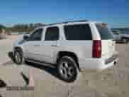 2008 Chevrolet Tahoe 2LT with VIN 1GNFC13048R268387, listed as a Copart auction lot 87075985 with 215,039 mi miles and Salvage title. Bid and sale history available at DreamBid. Image 2.