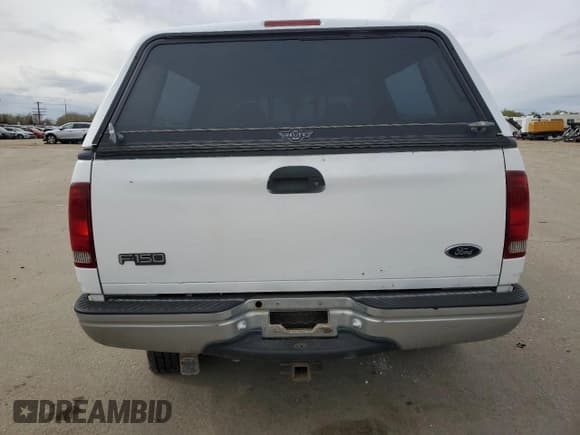 ✅ 1998 Ford F-150 • VIN: 1FTZX18W5WKB91459 • Lot: 52369095. Wystawiony na Copart z przebiegiem 185 660 mil. Bezpłatny archiwum sprzedaży aukcyjnych z USA i szczegółowy raport historii pojazdu na DreamBid. Zdjęcie 6.