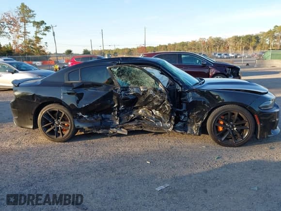 ✅ 2023 Dodge Charger GT • VIN: 2C3CDXHG7PH638980 • Lot: 43711407. Listed on IAAI with 16,736 mi. Free auction sales archive from the USA and detailed vehicle history report at DreamBid. Image 13.