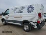 ✅ 2023 Ford Transit Cargo • VIN: 1FTLR1Y88PKB12594 • Lot: 57435735. Listed on Copart with 27,961 mi. Free auction sales archive from the USA and detailed vehicle history report at DreamBid. Image 2.