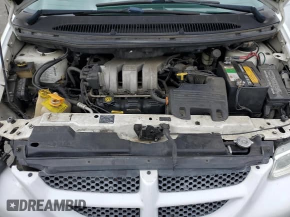 ✅ 2000 Dodge Caravan SE • VIN: 2B4GP44GXYR589372 • Лот: 82296735. Опубликован ранее на Copart с пробегом 276 759 миль. Бесплатный доступ к архиву аукционных продаж из США и подробный отчёт об истории автомобиля на DreamBid. Изображение 12.