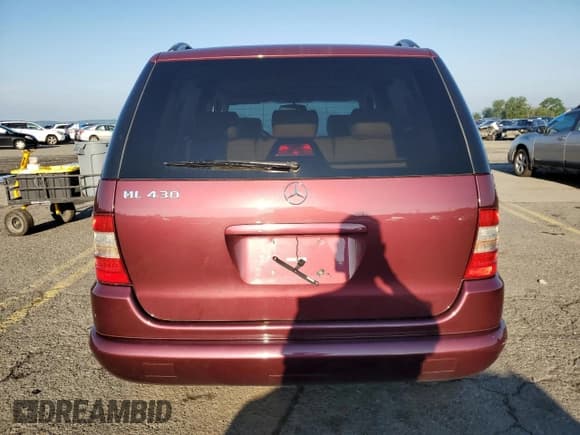 ✅ 1999 Mercedes-Benz M 320/430/500 • VIN: 4JGAB72E4XA088258 • Lot: 66375055. Listed on Copart with 60,613 mi. Free auction sales archive from the USA and detailed vehicle history report at DreamBid. Image 6.