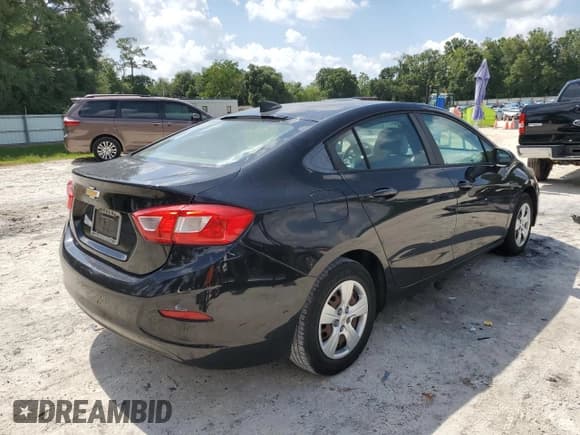 ✅ 2017 Chevrolet Cruze LS • VIN: 1G1BC5SM2H7109343 • Lot: 59654863. Listed on Copart with 97,882 mi. Free auction sales archive from the USA and detailed vehicle history report at DreamBid. Image 3.