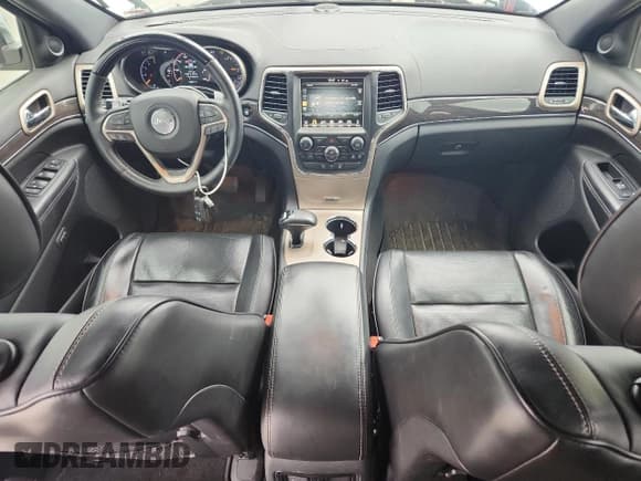 ✅ 2015 Jeep Grand Cherokee Overland • VIN: 1C4RJFCM9FC866700 • Lot: 86303435. Listed on Copart with 86,831 mi. Free auction sales archive from the USA and detailed vehicle history report at DreamBid. Image 8.