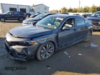 ✅ 2024 Honda Civic EX-L • VIN: 19XFL1H76RE014739 • Lot: 89539005. Listed on Copart with 26,677 mi. Free auction sales archive from the USA and detailed vehicle history report at DreamBid. Image 1.