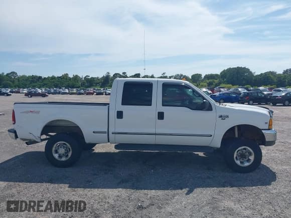 ✅ 1999 Ford F-350 XL • VIN: 1FTSW31L0XEB23392 • Lot: 42819533. Listed on IAAI with 261,153 mi. Free auction sales archive from the USA and detailed vehicle history report at DreamBid. Image 13.