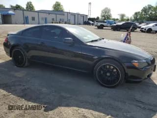 ✅ 2005 BMW 6 Series 645Ci • VIN: WBAEH73455B216215 • Лот: 52933134. Опубликован ранее на Copart с пробегом 335 794 миль. Бесплатный доступ к архиву аукционных продаж из США и подробный отчёт об истории автомобиля на DreamBid. Изображение 4.