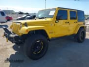 ✅ 2015 Jeep Wrangler Unlimited Sahara • VIN: 1C4BJWEG1FL561054 • Lot: 43579974. Listed on IAAI with 133,795 mi. Free auction sales archive from the USA and detailed vehicle history report at DreamBid. Image 2.