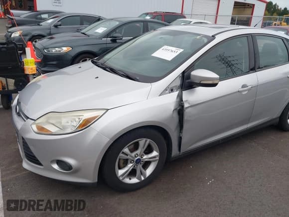 ✅ 2014 Ford Focus SE • VIN: 1FADP3F25EL312821 • Lot: 43557653. Listed on IAAI with 186,806 mi. Free auction sales archive from the USA and detailed vehicle history report at DreamBid. Image 2.