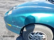 ✅ 1997 Pontiac Sunfire SE • VIN: 1G2JB5248V7546026 • Лот: 42525573. Опубликован ранее на IAAI с пробегом 67 416 миль. Бесплатный доступ к архиву аукционных продаж из США и подробный отчёт об истории автомобиля на DreamBid. Изображение 12.