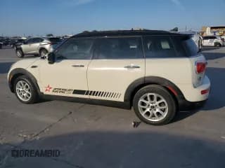 ✅ 2016 MINI Clubman • VIN: WMWLN5C51G2B34811 • Lot: 76921014. Listed on Copart with 75,659 mi. Free auction sales archive from the USA and detailed vehicle history report at DreamBid. Image 2.