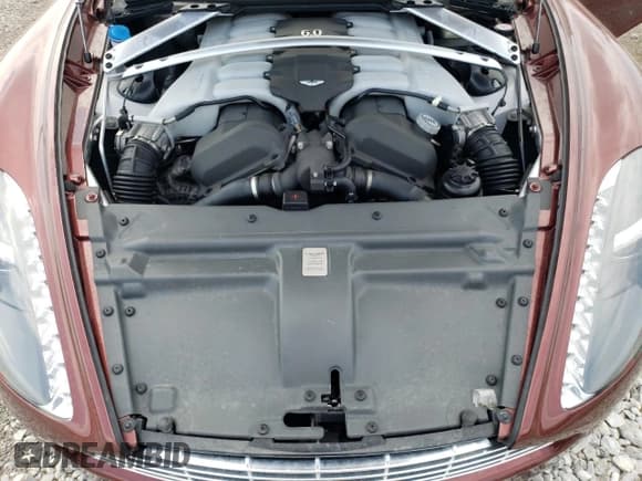 ✅ 2012 Aston Martin Rapide • VIN: SCFHDDAJXCGF03220 • Lot: 58703674. Wystawiony na Copart z przebiegiem 34 402 mil. Bezpłatny archiwum sprzedaży aukcyjnych z USA i szczegółowy raport historii pojazdu na DreamBid. Zdjęcie 11.