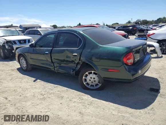 ✅ 2001 Nissan Maxima GXE • VIN: JN1CA31D41T606921 • Лот: 66935545. Опубликован ранее на Copart с пробегом 231 390 миль. Бесплатный доступ к архиву аукционных продаж из США и подробный отчёт об истории автомобиля на DreamBid. Изображение 2.