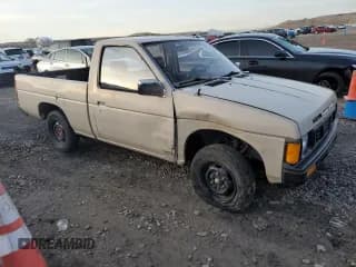 ✅ 1986 Nissan Hardbody E • VIN: JN6ND11S1GW037479 • Lot: 81775934. Wystawiony na Copart z przebiegiem 389 841 mil. Bezpłatny archiwum sprzedaży aukcyjnych z USA i szczegółowy raport historii pojazdu na DreamBid. Zdjęcie 4.