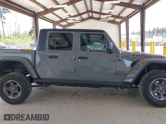 ✅ 2022 Jeep Gladiator Rubicon • VIN: 1C6JJTBG6NL166081 • Lot: 42204431. Listed on IAAI with 40,568 mi. Free auction sales archive from the USA and detailed vehicle history report at DreamBid. Image 14.
