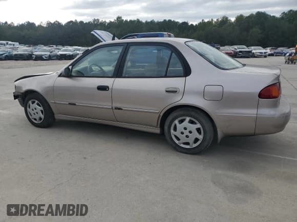 ✅ 1999 Toyota Corolla LE • VIN: 1NXBR12E6XZ148570 • Лот: 81554415. Опубликован ранее на Copart с пробегом 264 960 миль. Бесплатный доступ к архиву аукционных продаж из США и подробный отчёт об истории автомобиля на DreamBid. Изображение 2.