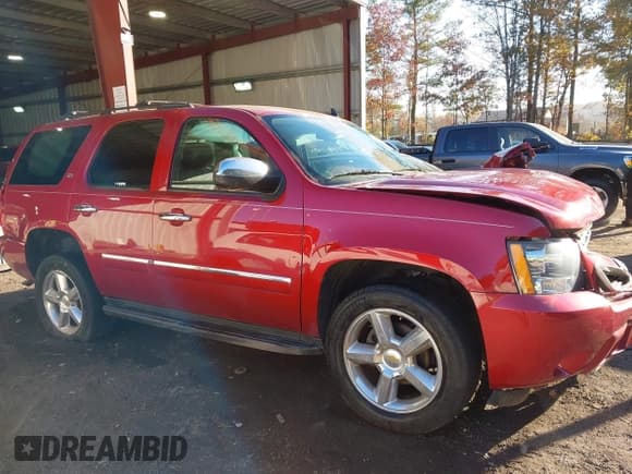 ✅ 2014 Chevrolet Tahoe LTZ • VIN: 1GNSKCE01ER160475 • Lot: 43675335. Listed on IAAI with 104,232 mi. Free auction sales archive from the USA and detailed vehicle history report at DreamBid. Image 13.