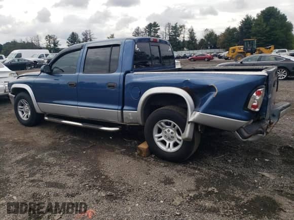 2003 Dodge Dakota SLT с VIN 1D7HL48X93S367092, выставлен на аукционе Copart как лот 71961274 с пробегом 160 709 миль миль и Списание • Salvage title. История ставок и продаж доступна на DreamBid. Изображение 2.