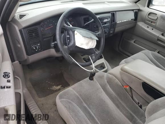 2004 Dodge Dakota Sport z VIN 1D7GL32N34S708694, wystawiony jako Copart lot #85050064 z przebiegiem Nie podano mil oraz Szkoda całkowita • Salvage title. Historia ofert i sprzedaży dostępna na DreamBid. Obrazek 8.