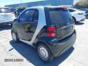 ✅ 2013 Smart fortwo Pure • VIN: WMEEJ3BA6DK676071 • Lot: 42677618. Wystawiony na IAAI z przebiegiem 191 709 mil. Bezpłatny archiwum sprzedaży aukcyjnych z USA i szczegółowy raport historii pojazdu na DreamBid. Zdjęcie 3.