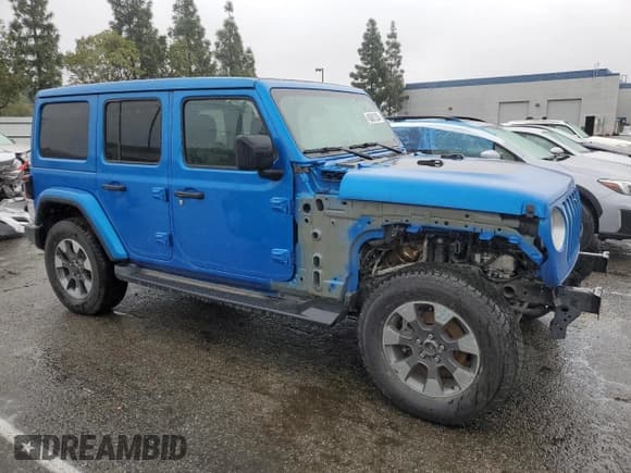 ✅ 2021 Jeep Wrangler Unlimited Sahara Altitude • VIN: 1C4HJXEG7MW728612 • Lot: 45001535. Listed on Copart with 24,027 mi. Free auction sales archive from the USA and detailed vehicle history report at DreamBid. Image 4.