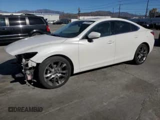 ✅ 2015 Mazda 6 i Grand Touring • VIN: JM1GJ1W54F1186648 • Lot: 87308045. Listed on Copart with 252,134 mi. Free auction sales archive from the USA and detailed vehicle history report at DreamBid. Image 1.