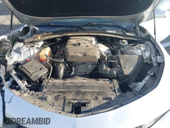 ✅ 2018 Chevrolet Camaro 1LT • VIN: 1G1FB3DX6J0126838 • Lot: 41682004. Listed on IAAI with 65,957 mi. Free auction sales archive from the USA and detailed vehicle history report at DreamBid. Image 10.