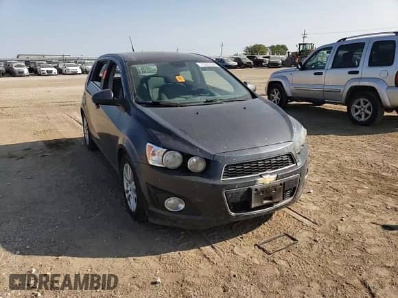 2012 Chevrolet Sonic LT с VIN 1G1JC6SH1C4187580, выставлен на аукционе Copart как лот 71091034 с пробегом Не указан миль и Списание • Salvage title. История ставок и продаж доступна на DreamBid. Изображение 12.