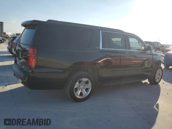 ✅ 2019 Chevrolet Suburban LT • VIN: 1GNSCHKC1KR117386 • Lot: 87294265. Listed on Copart with 165,867 mi. Free auction sales archive from the USA and detailed vehicle history report at DreamBid. Image 3.