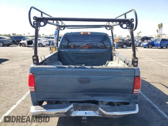 2002 Dodge Dakota SLT z VIN 1B7HL48N52S632677, wystawiony jako Copart lot #76509804 z przebiegiem 241 947 mil mil oraz Szkoda całkowita • Salvage title. Historia ofert i sprzedaży dostępna na DreamBid. Obrazek 6.