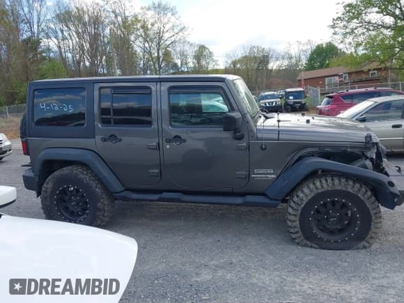 ✅ 2018 Jeep Wrangler Unlimited Sport S • VIN: 1C4HJWDG2JL930461 • Lot: 42042644. Listed on IAAI with 136,530 mi. Free auction sales archive from the USA and detailed vehicle history report at DreamBid. Image 13.