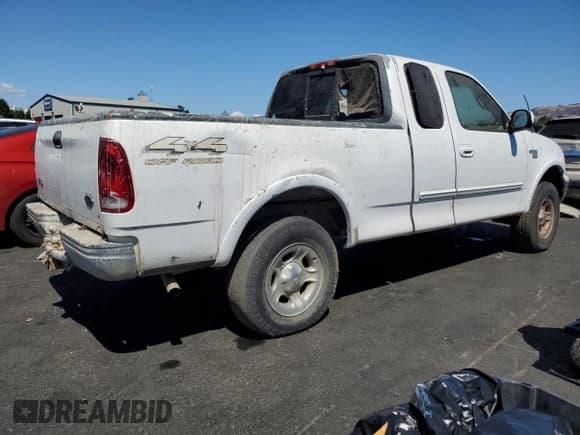 ✅ 1999 Ford F-150 XL • VIN: 1FTRX18L5XKA14157 • Lot: 72102355. Listed on Copart with Not provided. Free auction sales archive from the USA and detailed vehicle history report at DreamBid. Image 3.