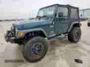 2005 Jeep Wrangler X с VIN 1J4FA39S35P333959, выставлен на аукционе Copart как лот 59576665 с пробегом 261 856 миль миль и Списание • Salvage title. История ставок и продаж доступна на DreamBid. Изображение 1.