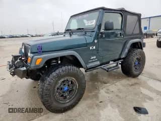 2005 Jeep Wrangler X z VIN 1J4FA39S35P333959, wystawiony jako Copart lot #59576665 z przebiegiem 261 856 mil mil oraz Szkoda całkowita • Salvage title. Historia ofert i sprzedaży dostępna na DreamBid. Obrazek 1.