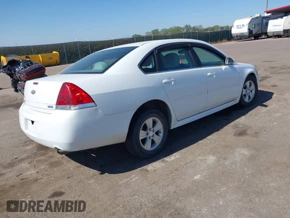 2013 Chevrolet Impala LS with VIN 2G1WF5E37D1141434, listed as a IAAI auction lot 43322378 with 159,237 mi miles and . Bid and sale history available at DreamBid. Image 4.