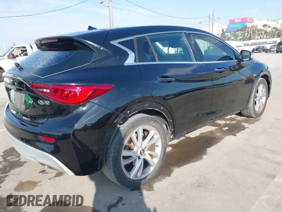 ✅ 2017 Infiniti QX30 Premium • VIN: SJKCH5CP1HA020000 • Lot: 43832648. Listed on IAAI with 98,833 mi. Free auction sales archive from the USA and detailed vehicle history report at DreamBid. Image 4.