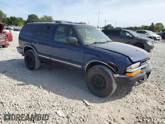 2001 Chevrolet Blazer LT с VIN 1GNDT13WX12194046, выставлен на аукционе Copart как лот 69308984 с пробегом 206 654 миль миль и Списание • Salvage title. История ставок и продаж доступна на DreamBid. Изображение 4.