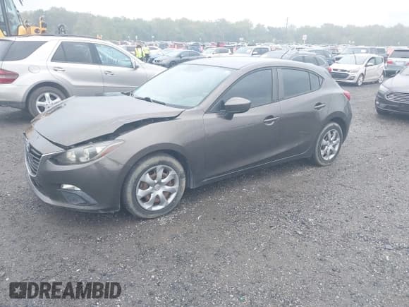 ✅ 2014 Mazda 3 i Sport • VIN: JM1BM1K7XE1214332 • Lot: 43243473. Listed on IAAI with 104,994 mi. Free auction sales archive from the USA and detailed vehicle history report at DreamBid. Image 2.