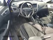 ✅ 2014 Hyundai Veloster • VIN: KMHTC6ADXEU194525 • Lot: 65131764. Wystawiony na Copart z przebiegiem 124 560 mil. Bezpłatny archiwum sprzedaży aukcyjnych z USA i szczegółowy raport historii pojazdu na DreamBid. Zdjęcie 8.