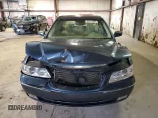 2009 Hyundai Azera GLS z VIN KMHFC46D89A349297, wystawiony jako Copart lot #85777694 z przebiegiem 103 647 mil mil oraz Szkoda całkowita • Salvage title. Historia ofert i sprzedaży dostępna na DreamBid. Obrazek 5.