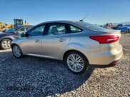 ✅ 2018 Ford Focus Titanium • VIN: 1FADP3J20JL279387 • Lot: 89741505. Wystawiony na Copart z przebiegiem 88 848 mil. Bezpłatny archiwum sprzedaży aukcyjnych z USA i szczegółowy raport historii pojazdu na DreamBid. Zdjęcie 2.